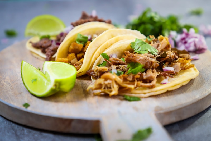 Korean BBQ pulled pork tacos with spicy slaw on flour tortillas